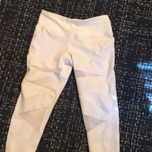 White leggings with mesh panels